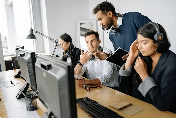 People calling on call center software in a call center
