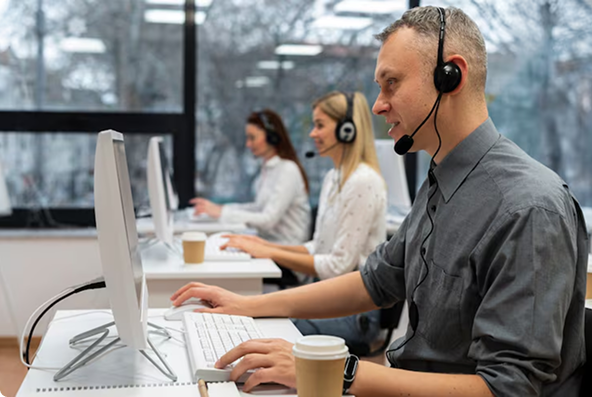 People in a Call center on a wor desk