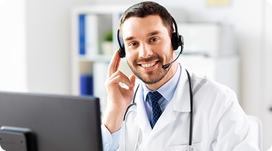 a doctor with good smiling and talking someone using headphone